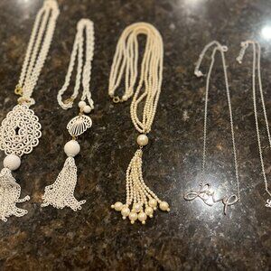 Lot of 5 miscellaneous style necklaces 3 with tassels and 2 with script LOVE
